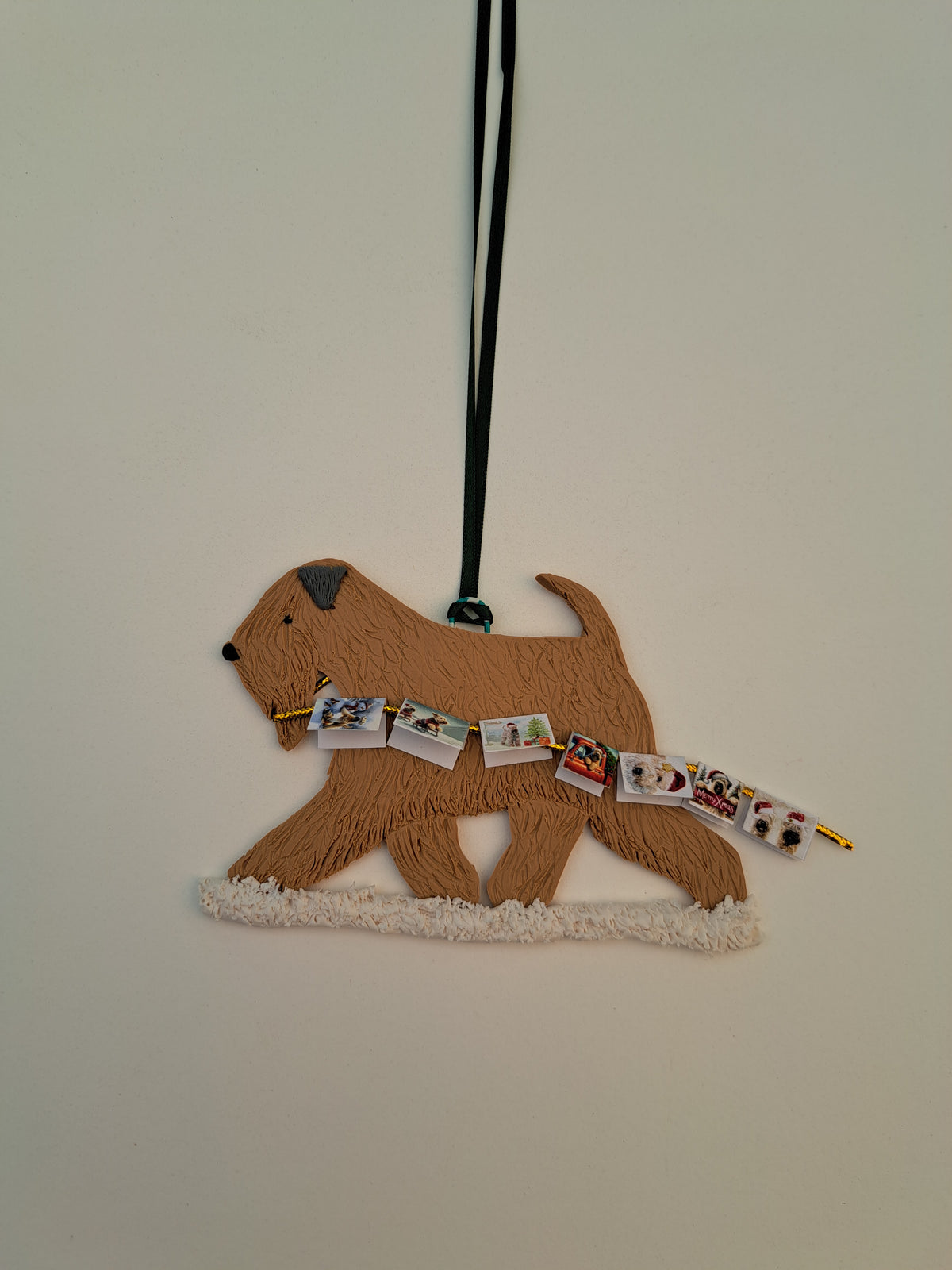 Cheeky Wheaten Terrier Running With Christmas Cards